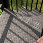 Suburban Waterfront Home with Steel Balcony Stair