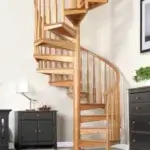 all wood spiral staircase n bedroom leading up to loft