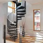 classic all steel spiral stair going up to loft