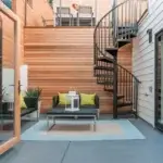 outdoor spiral stair to rooftop deck