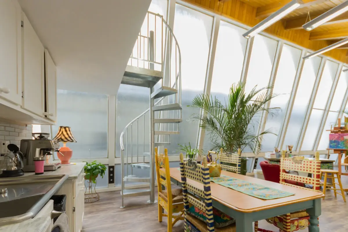 galvanized spiral staircase to indoor loft